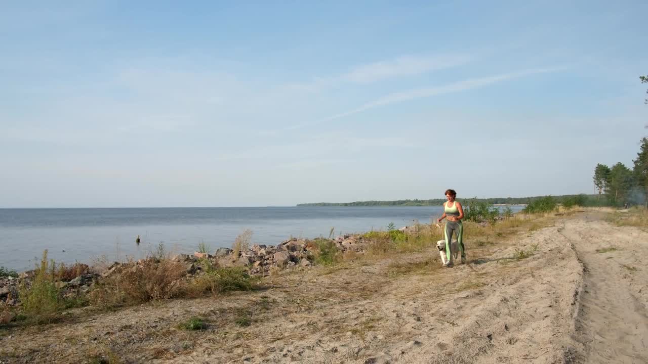 Stock Video Out For A Run With Her Pet Dog Live Wallpaper