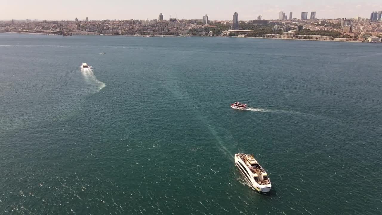 Stock Video Over The Sea With Boats Near A Sunny Coast Live Wallpaper