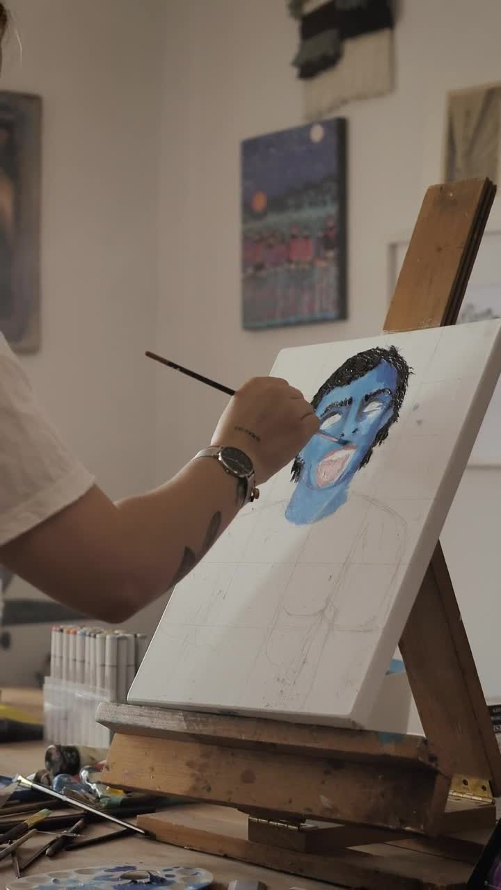 Stock Video Painter Depicting An Artistic Work On A Canvas Live Wallpaper