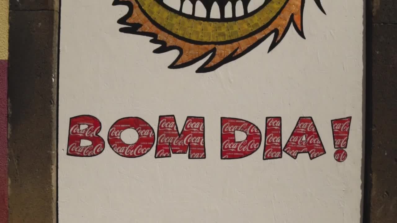 Stock Video Painted Sign On A Building With The Words Bom Dia Live Wallpaper