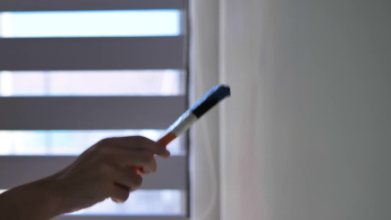Stock Video Painting A Wall In A New House Live Wallpaper