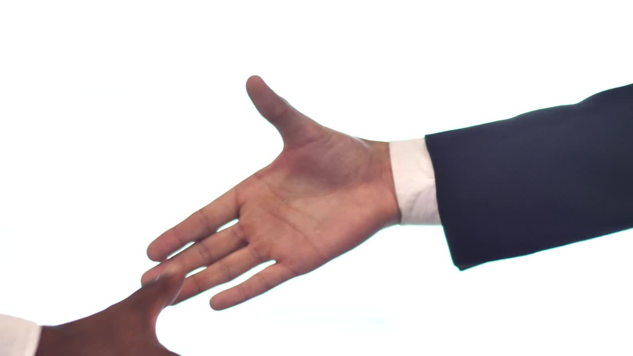 Stock Video Pair Of Hands Shaking Hands On White Background Live Wallpaper