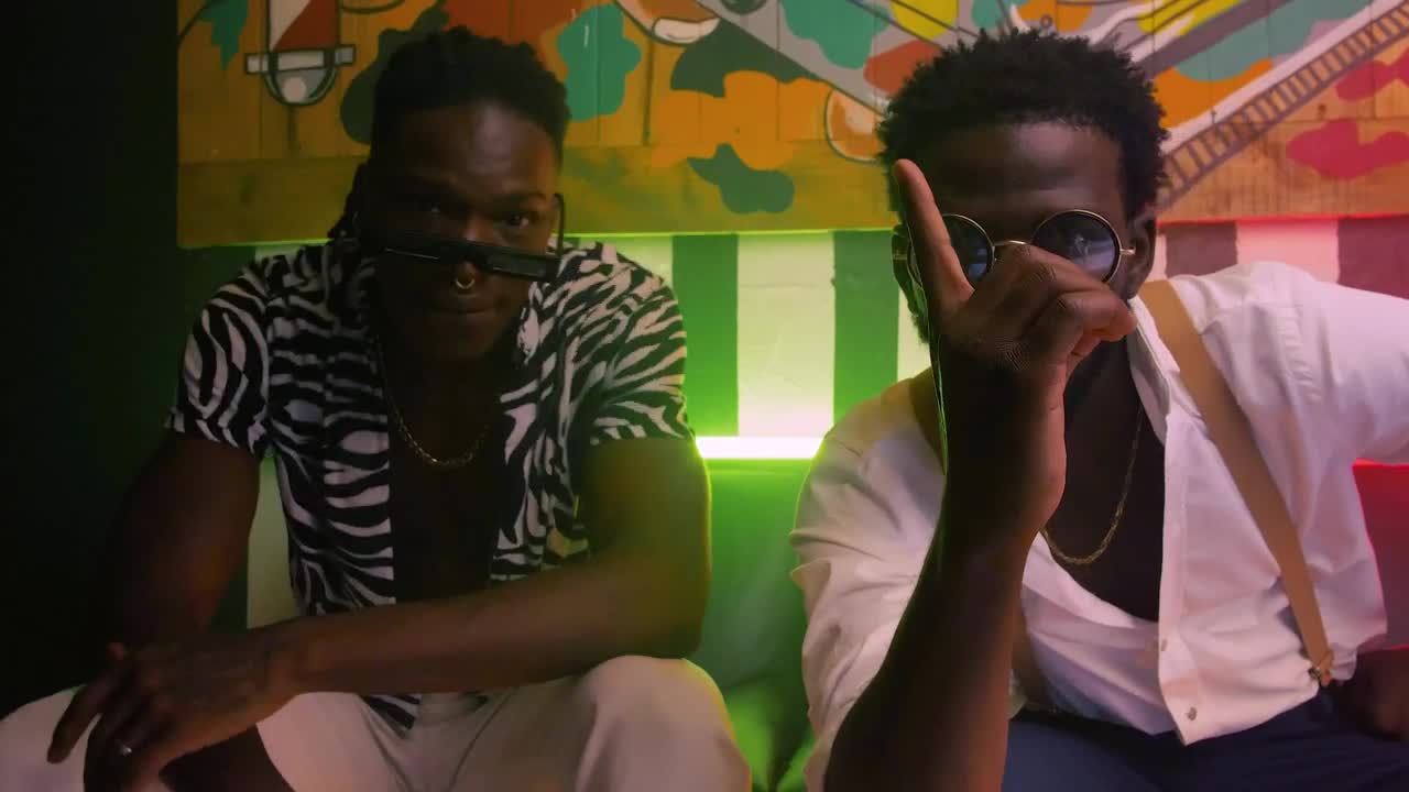 Stock Video Pair Of Young Men With Urban Style Live Wallpaper