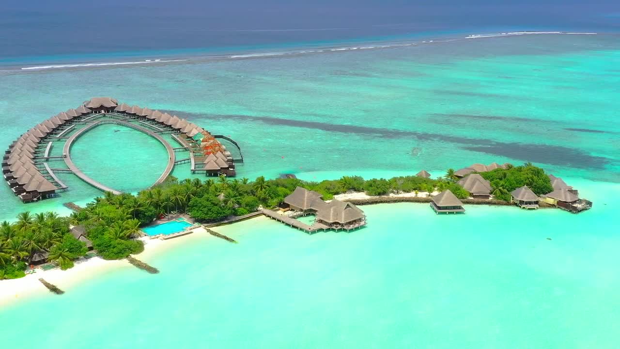 Stock Video Paradise Beach With Bungalows Over The Sea Live Wallpaper