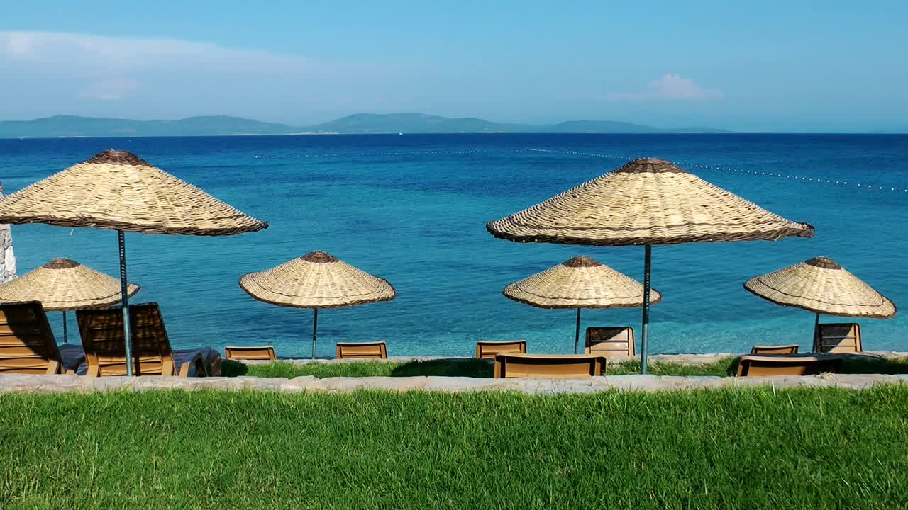 Stock Video Paradise Beach With Lounge Chairs And Umbrellas Live Wallpaper