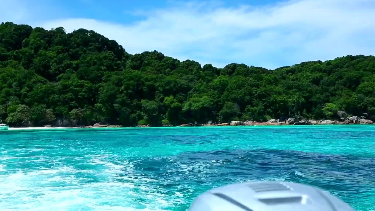 Stock Video Paradisiac View From The Back Of A Motorboat Live Wallpaper