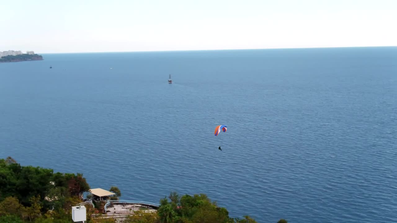 Stock Video Paragliding Over The Cliffs Live Wallpaper