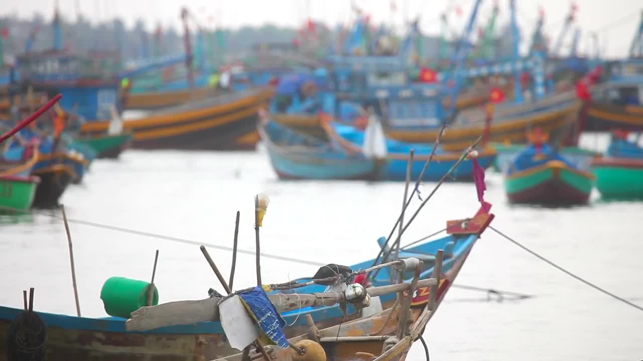 Stock Video Parked Fisher Boats Moving With The Tide Live Wallpaper