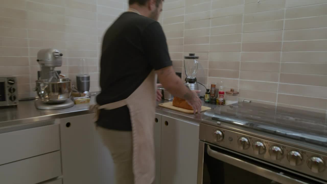 Stock Video Pastry Chef Working In A Modern Kitchen Live Wallpaper