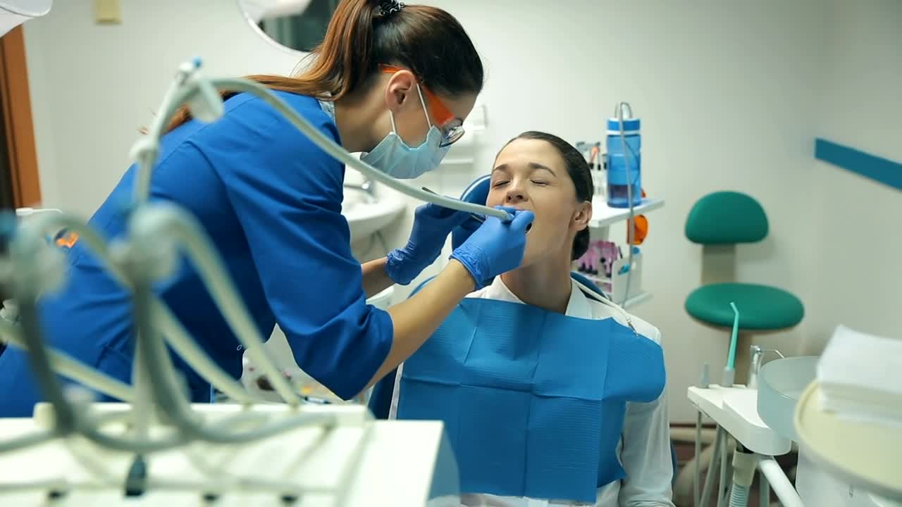 Stock Video Patient Receiving Dental Treatment Live Wallpaper