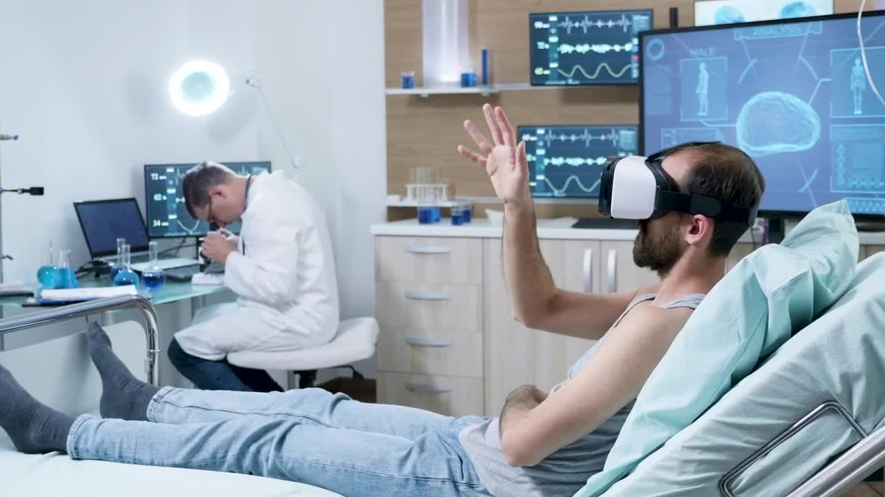 Stock Video Patient Looks At Brain Using Vr Technology In Modern Hospital Live Wallpaper