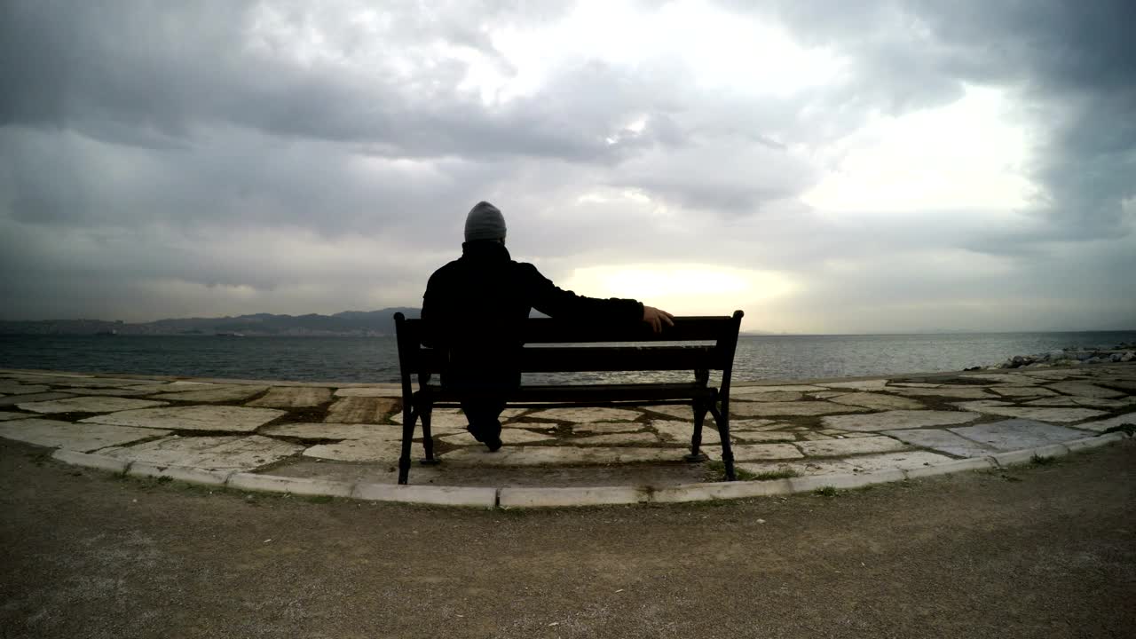 Stock Video Peaceful Man Looking Out To Sea Live Wallpaper