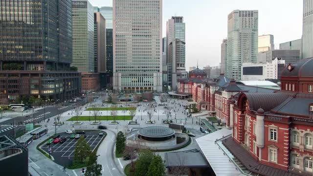 Stock Video People And Cars Moving In A City Of Large Buildings Live Wallpaper