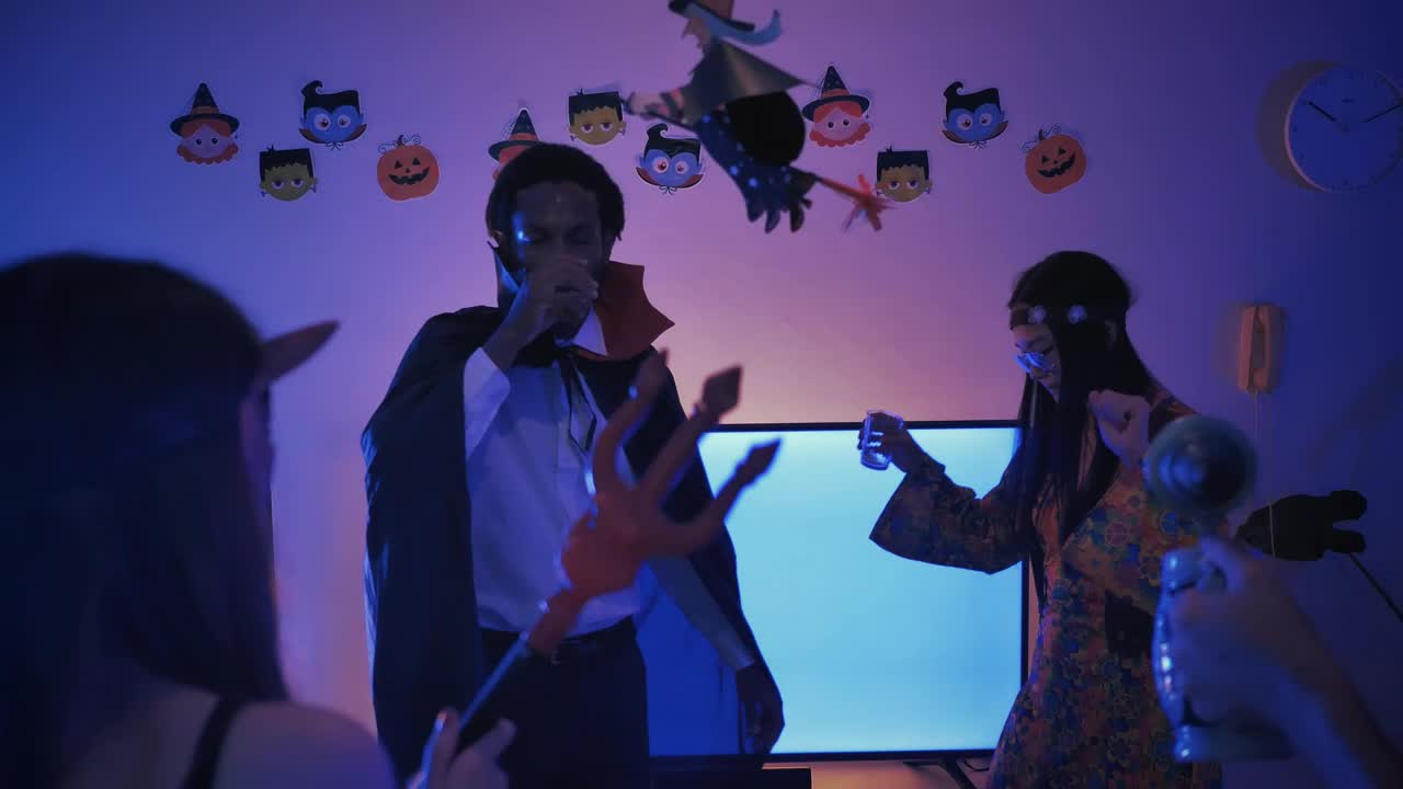 Stock Video People Dancing At A Little Costume Party Live Wallpaper