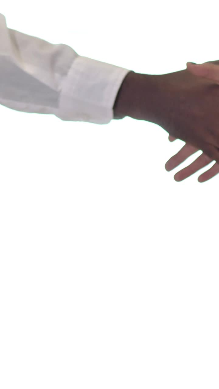 Stock Video People Hands Giving A Handshake On A White Background Live Wallpaper