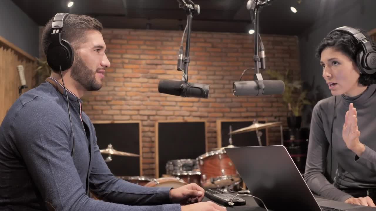 Stock Video People Recording A Podcast In A Studio Live Wallpaper