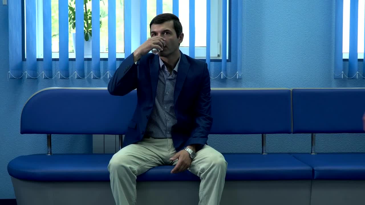 Stock Video People Sitting In A Hospital Waiting Room Live Wallpaper