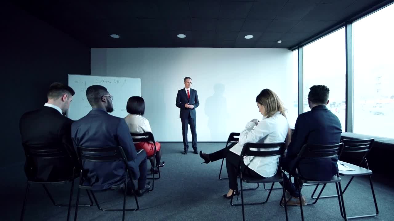 Stock Video People Walk Away From Business Talk Live Wallpaper