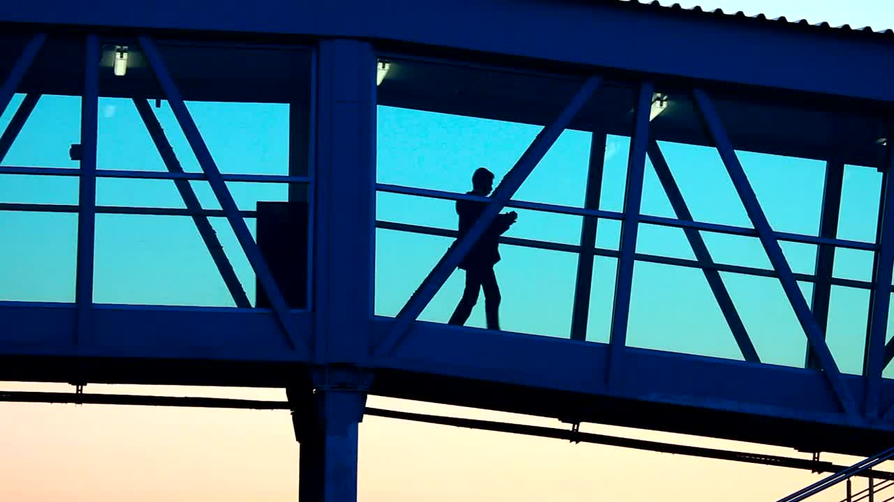 Stock Video People Walking In Airport Tunnel Live Wallpaper