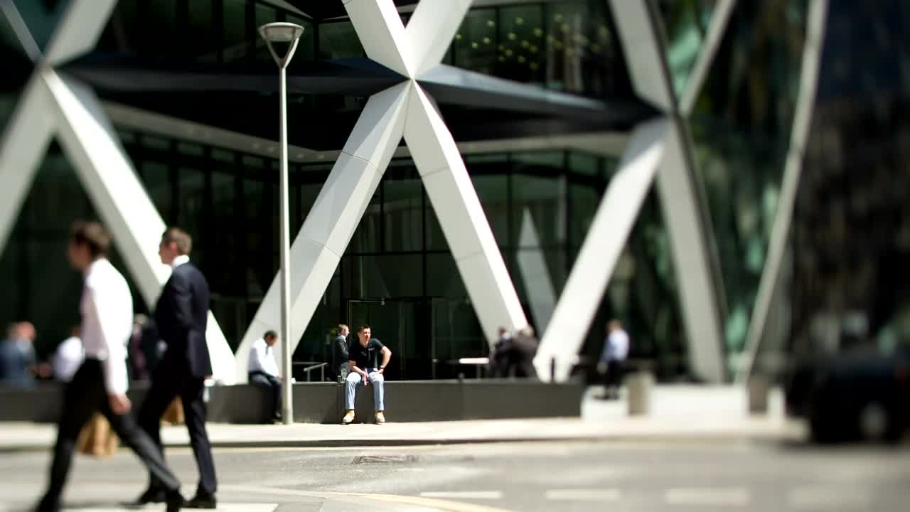 Stock Video People Walking In Front Of A Building Live Wallpaper
