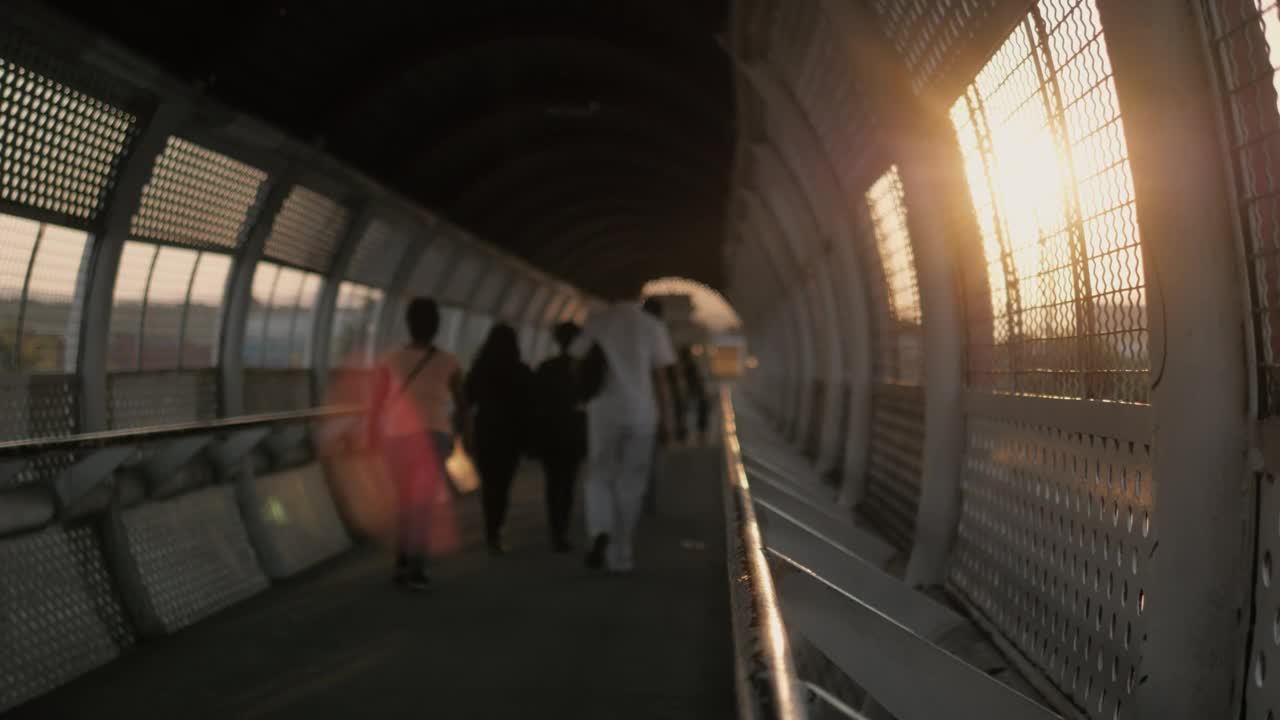 Stock Video People Walking On A Footbridge Live Wallpaper
