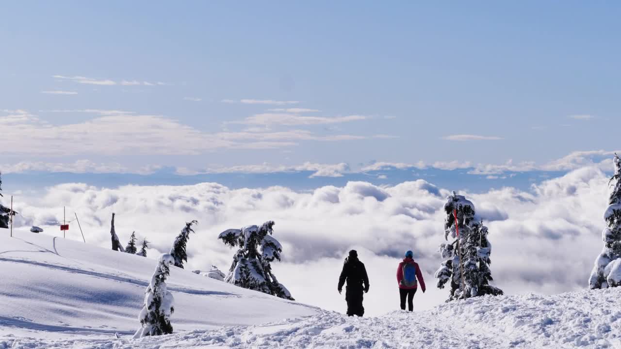 Stock Video People Walking On The Snowy Summit Live Wallpaper