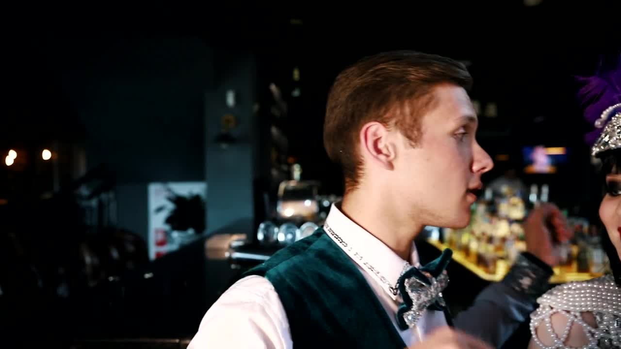 Stock Video People Wearing Retro Party Costumes In A Bar Live Wallpaper