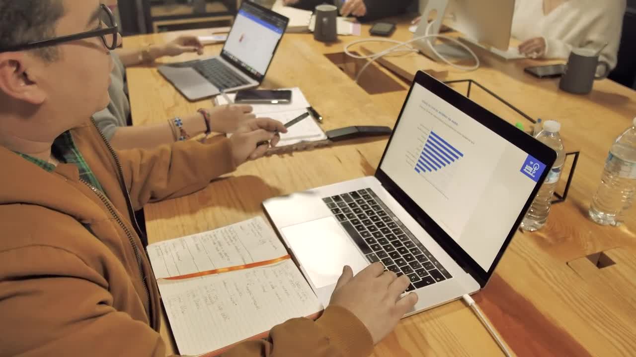 Stock Video People Working On A Wooden Table Live Wallpaper