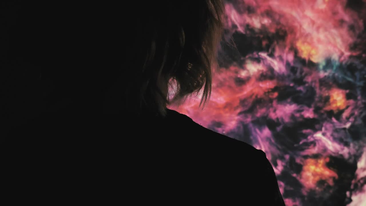 Stock Video Person Appreciating An Image Of A Nebula Live Wallpaper