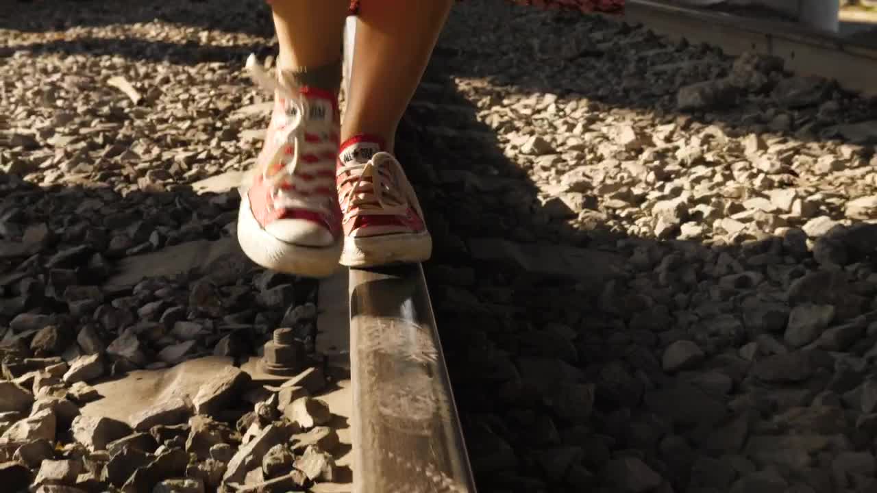 Stock Video Person Balancing On Train Track Live Wallpaper