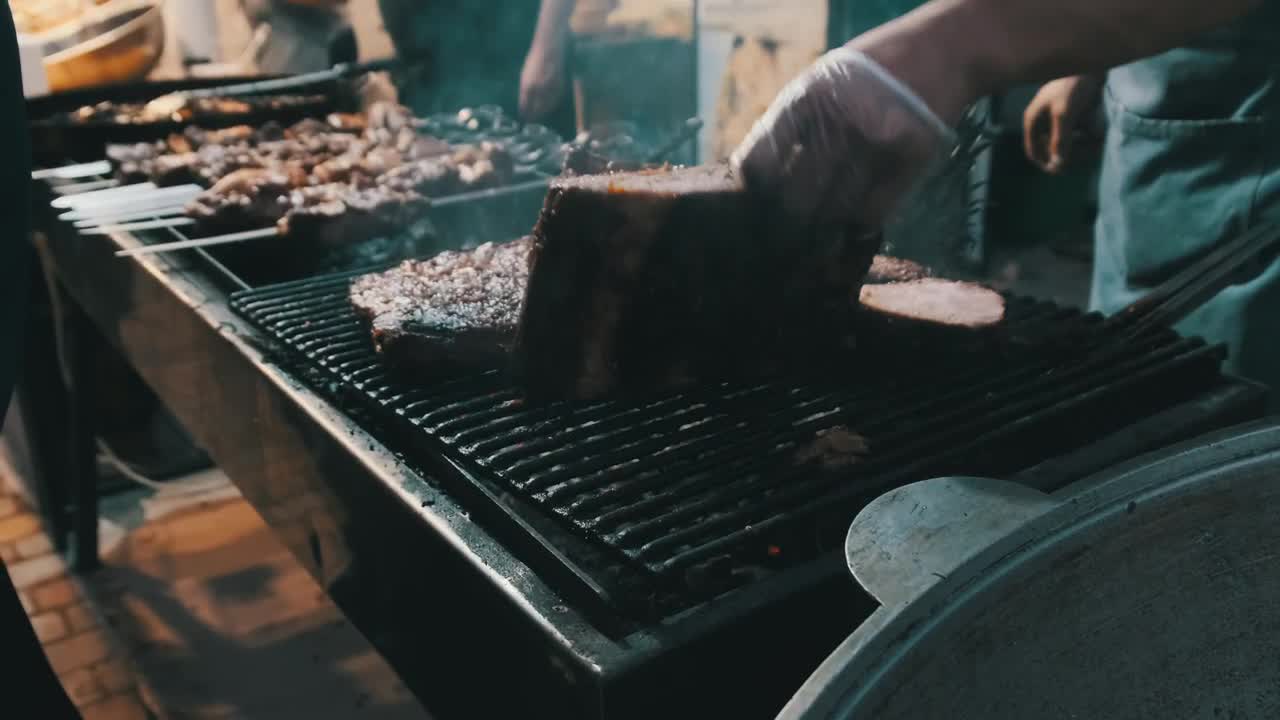 Stock Video Person Cooking Cuts Of Meat On The Grill Live Wallpaper