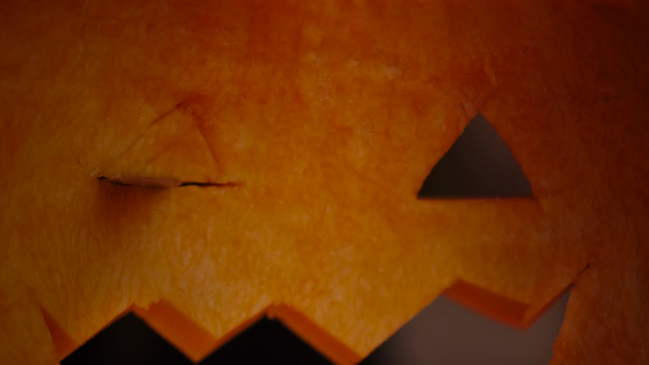 Stock Video Person Cutting A Halloween Pumpkin Live Wallpaper