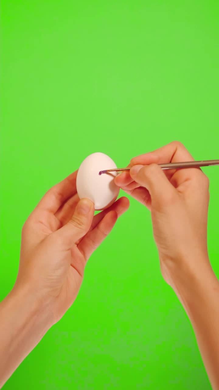 Stock Video Person Decorating An Egg With Hearts Live Wallpaper