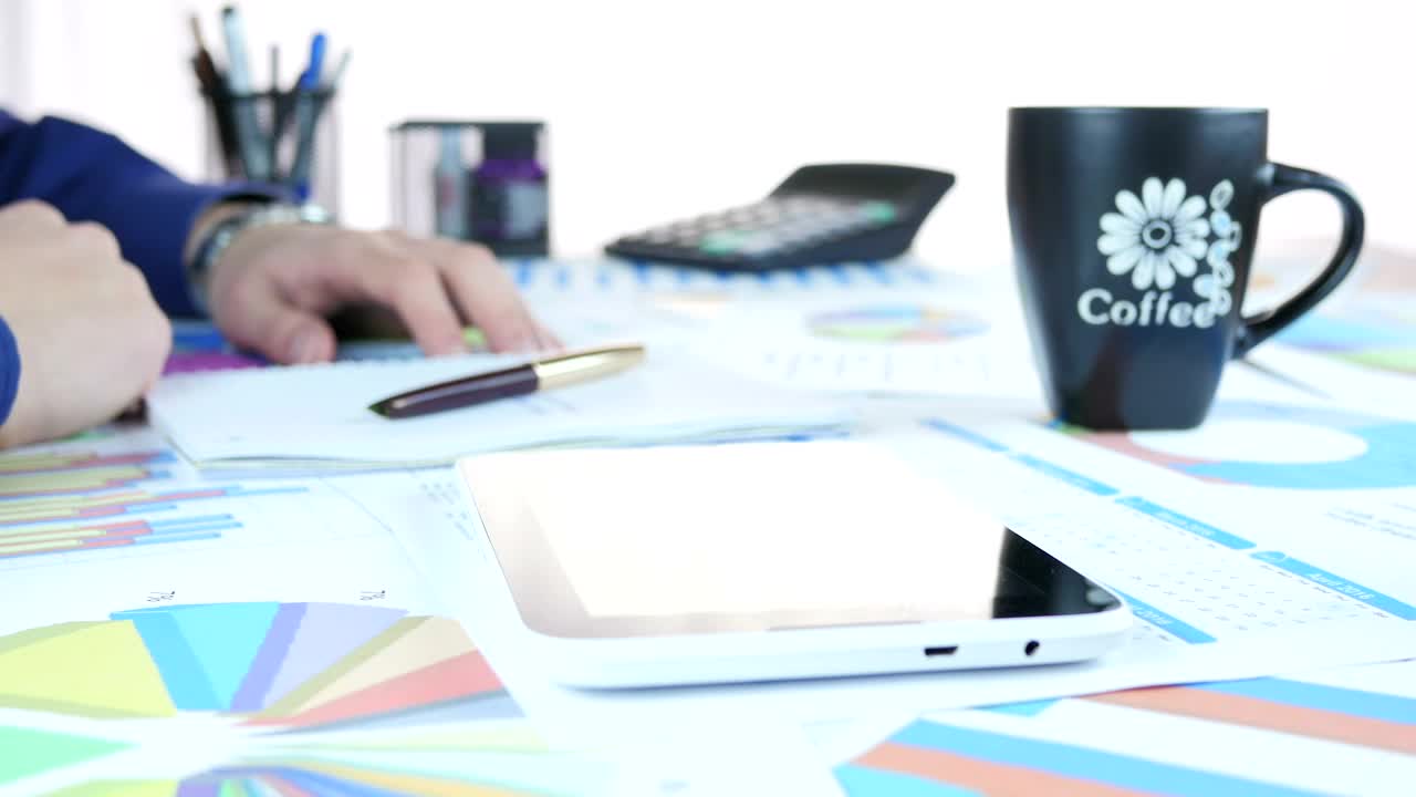 Stock Video Person Doing Accounts With A Tablet Live Wallpaper