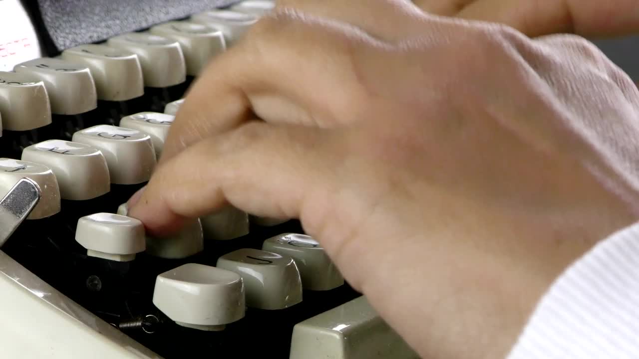Stock Video Person Hands Typing On Typewriter Live Wallpaper
