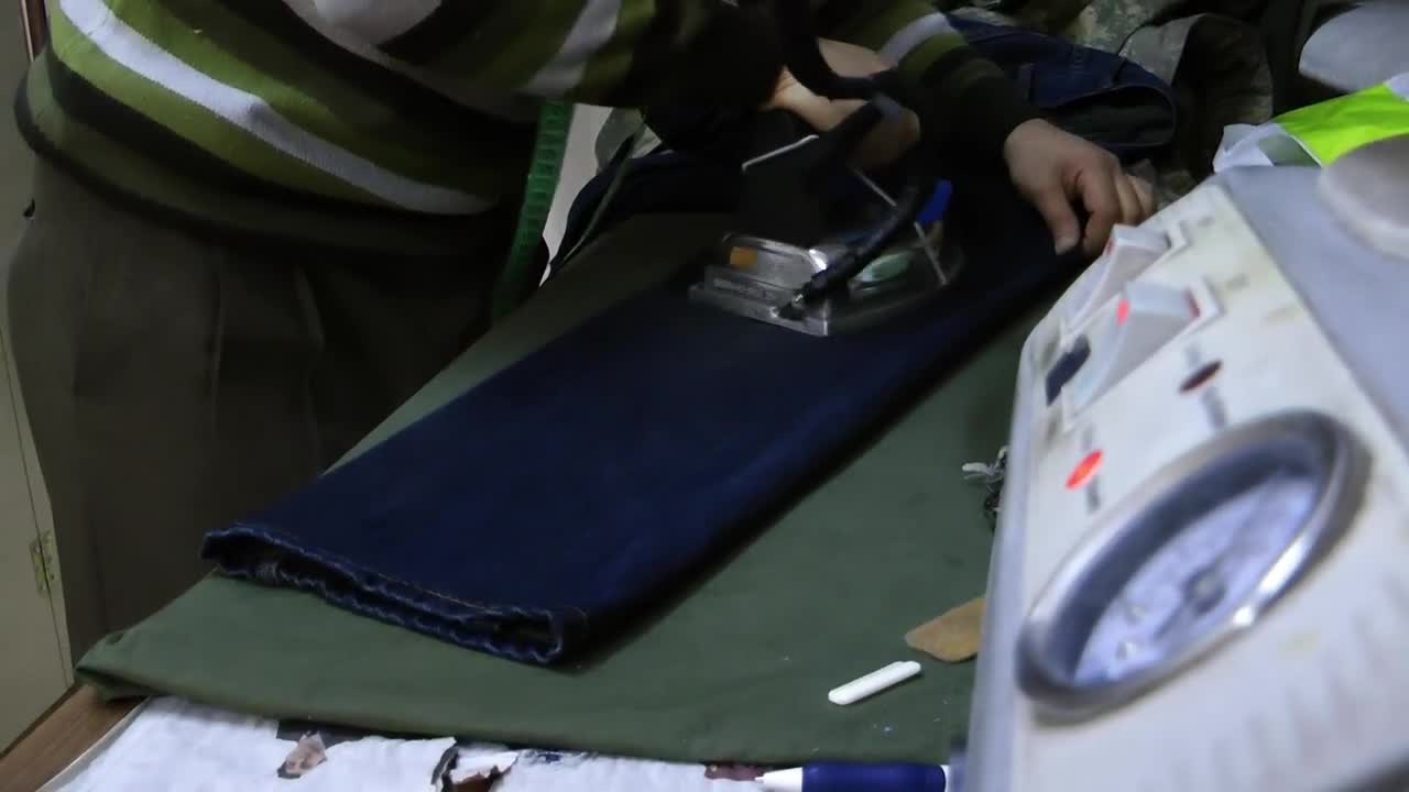Stock Video Person Ironing A Pants Live Wallpaper
