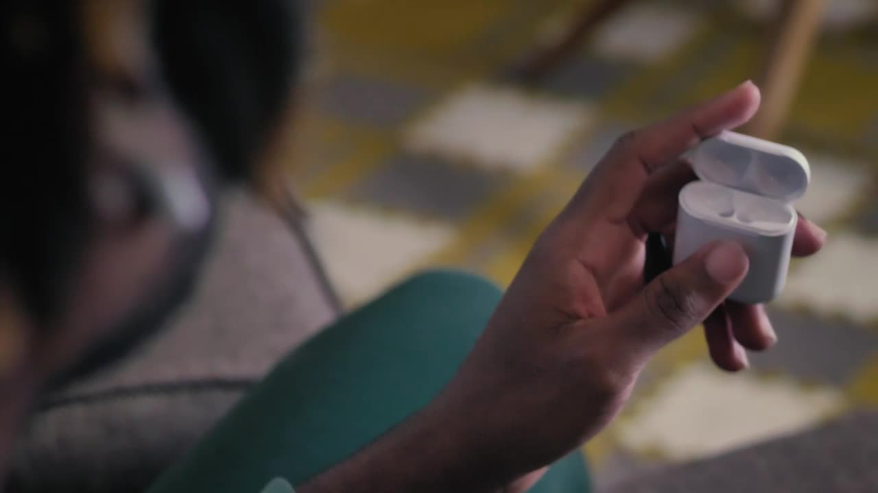 Stock Video Person Keeping His Bluetooth Headphones Live Wallpaper