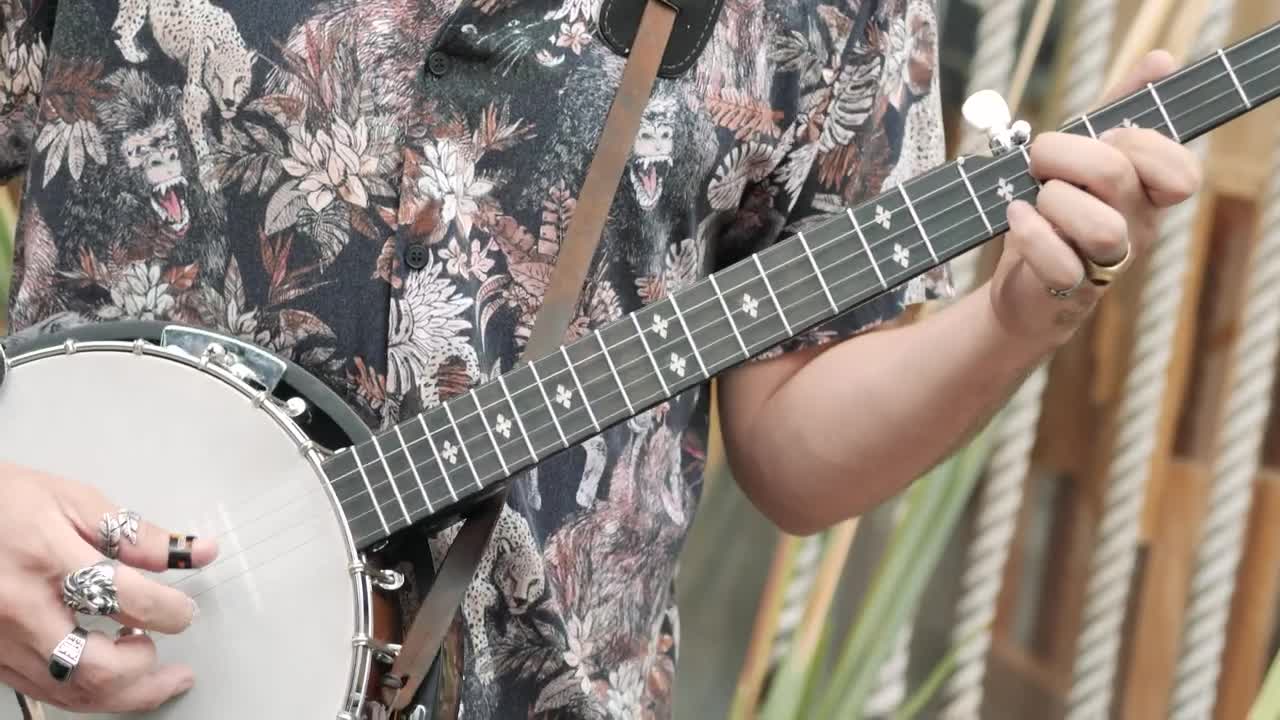 Stock Video Person Nimbly Playing The Banjo Live Wallpaper
