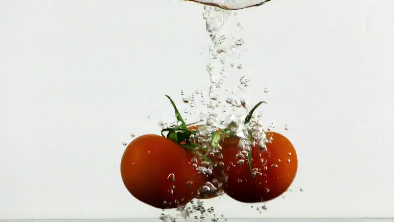 Video Stock Red Tomatoes Submerging In Water Live Wallpaper Free