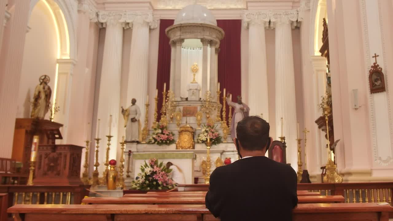 Video Stock Person Praying In Front Of An Altar Inside A Church Live Wallpaper Free