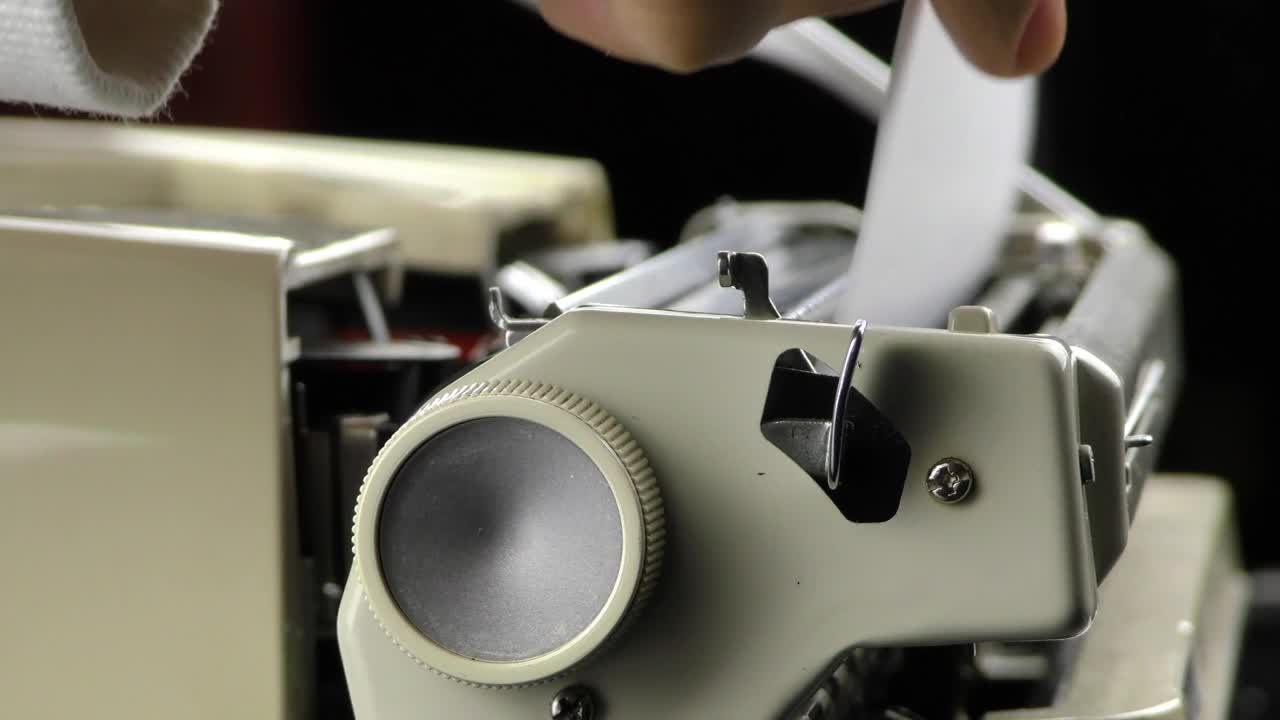 Video Stock Person Putting Paper On A Typewriter Live Wallpaper Free