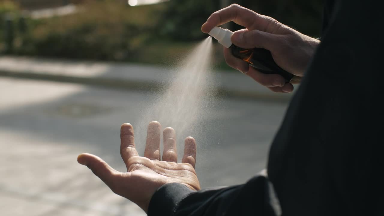 Video Stock Person Sanitizes His Hand With Spray Live Wallpaper Free