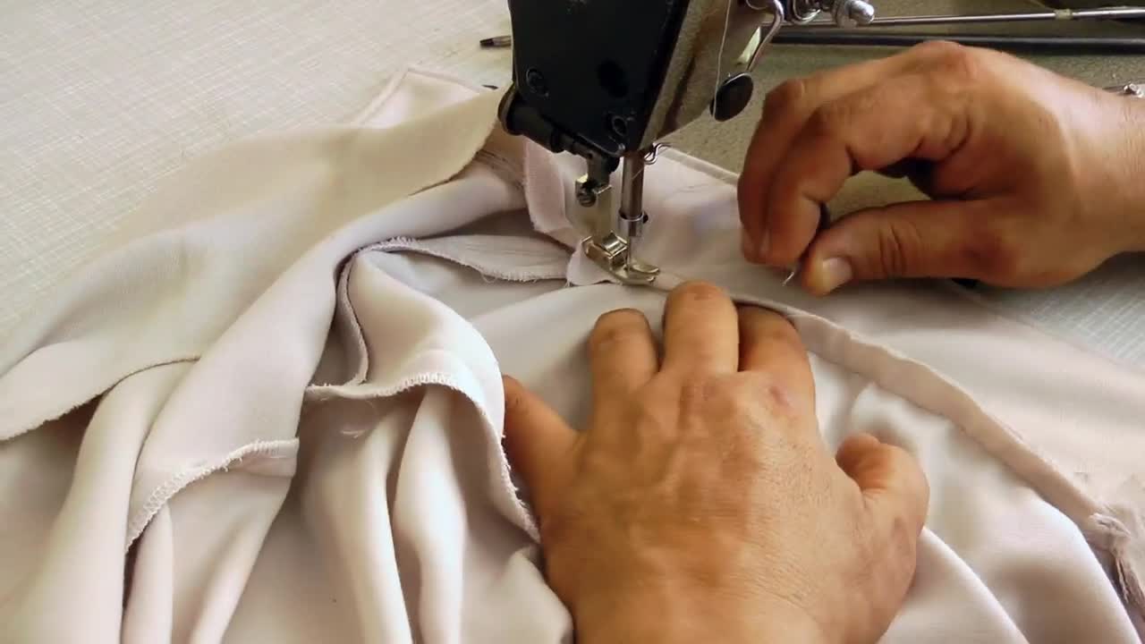 Video Stock Person Sewing A Shirt On Machine Live Wallpaper Free