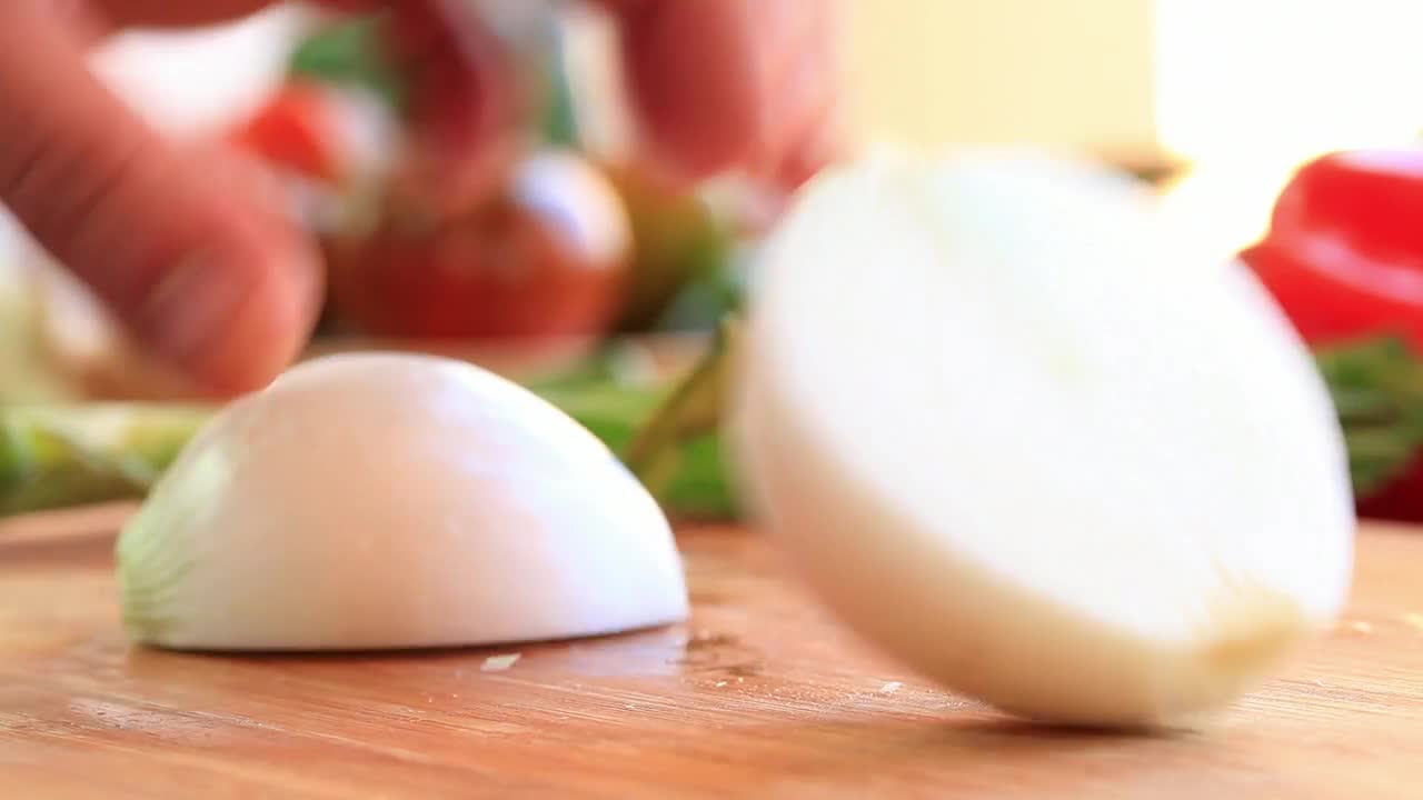 Video Stock Person Slicing Onion On A Board Live Wallpaper Free