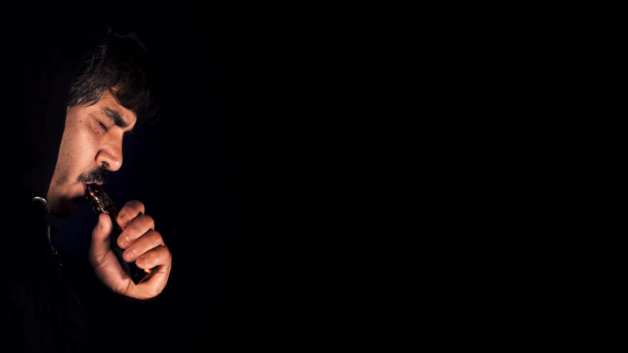 Video Stock Person Smoking An Electronic Cigarette In The Dark Live Wallpaper Free