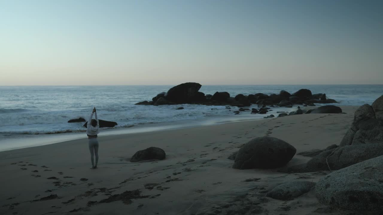 Video Stock Person Stretching On The Beach Live Wallpaper Free