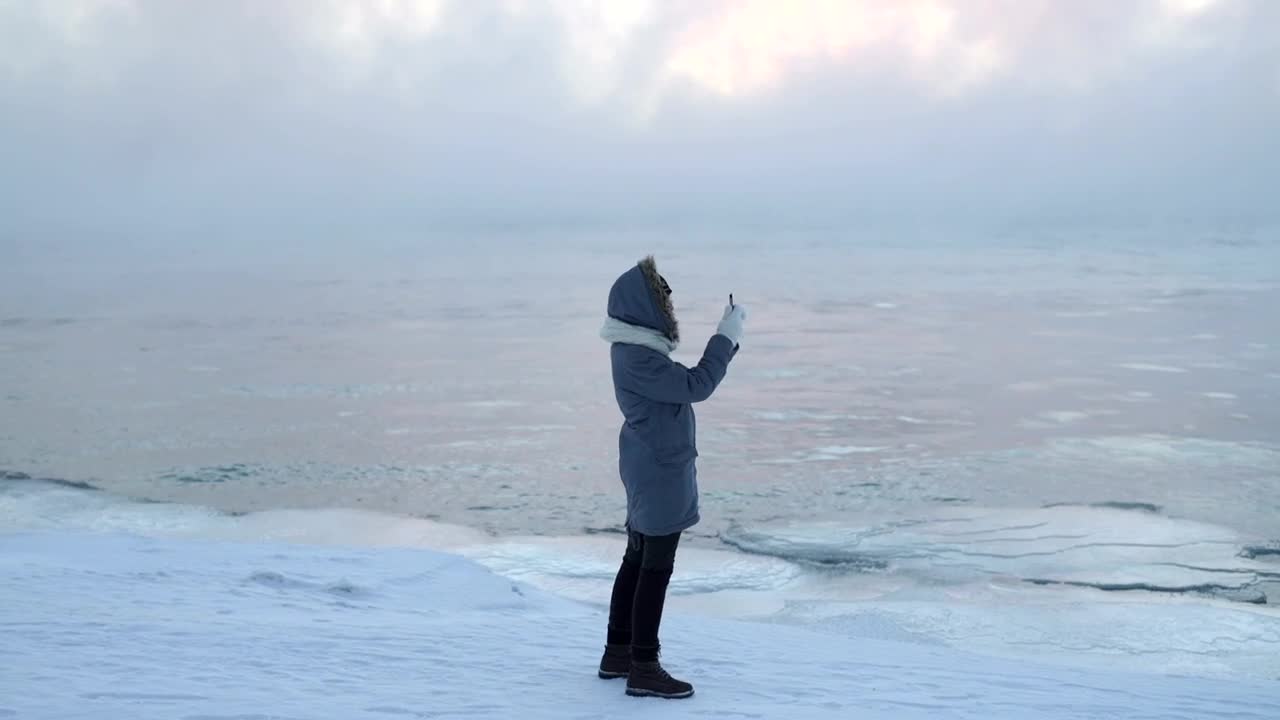 Video Stock Person Taking Pictures With His Cellphone On Ice Live Wallpaper Free