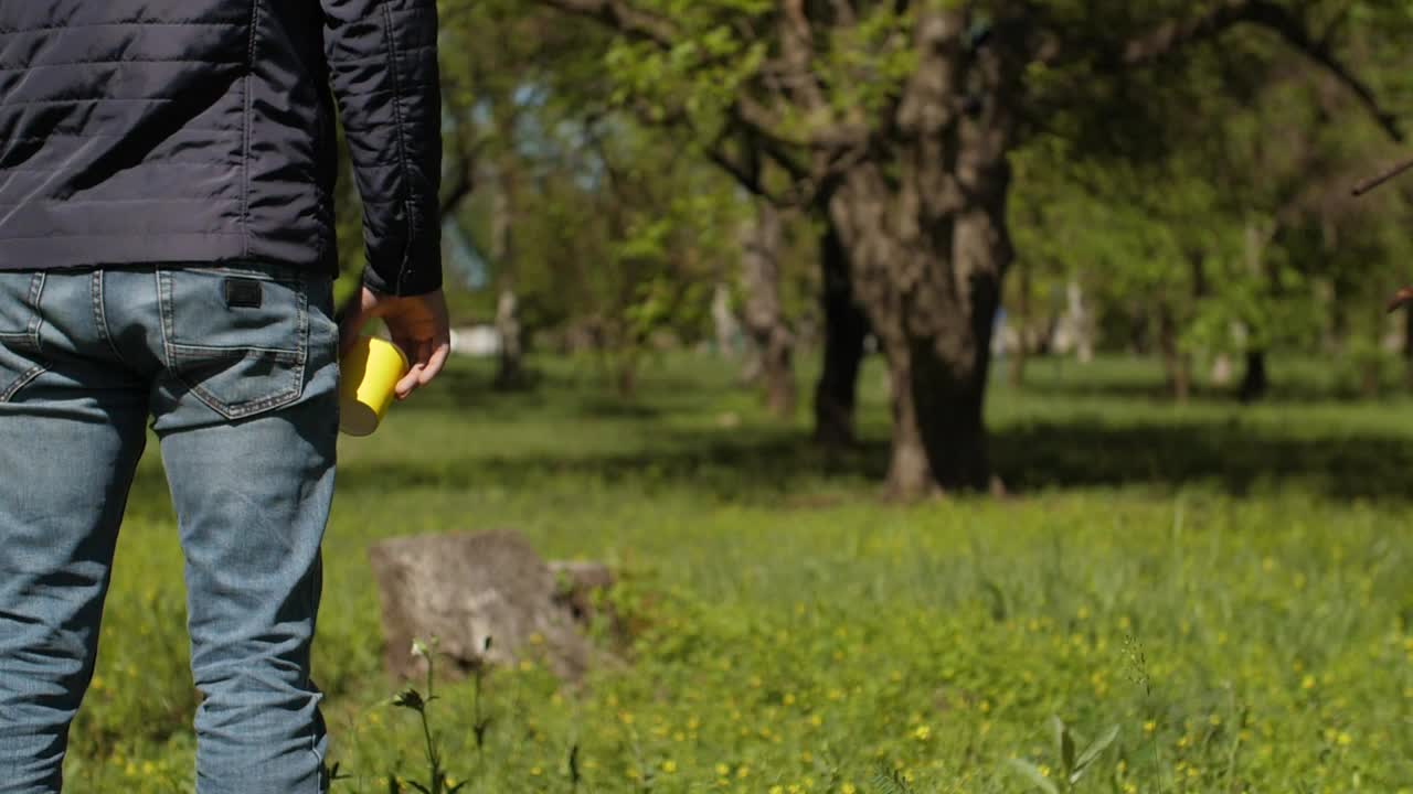 Video Stock Person Throwing Garbage In Nature Live Wallpaper Free