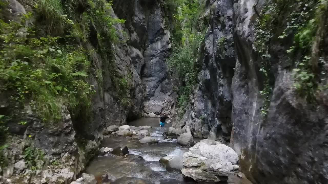 Video Stock Person Walking By A River In The Mountains Live Wallpaper Free