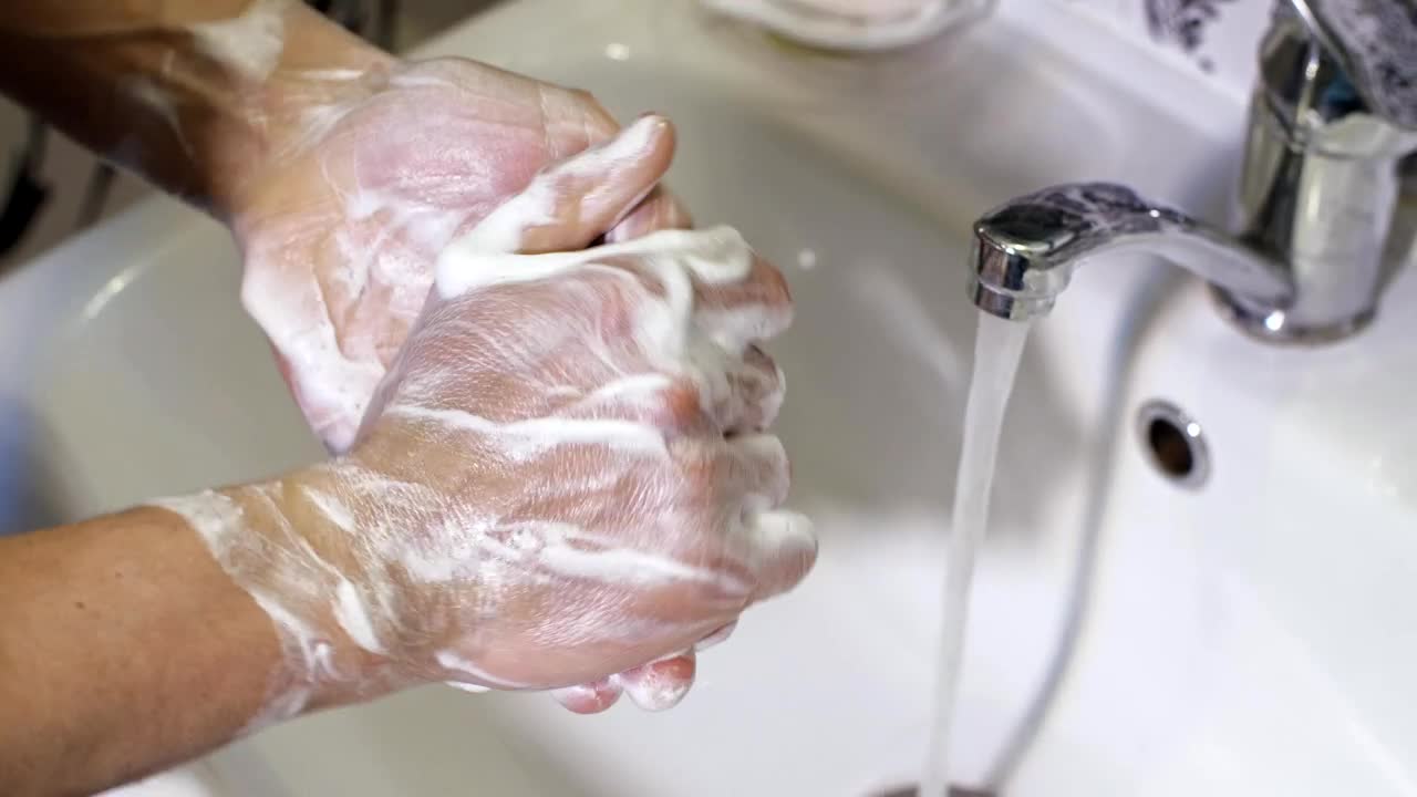 Video Stock Person Washing Hands With Soap Live Wallpaper Free